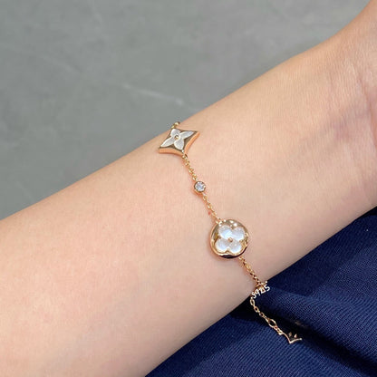 [BLUE TEARS]STAR AND SUN 4 MOTIF WHITE MOP PINK GOLD BRACELET